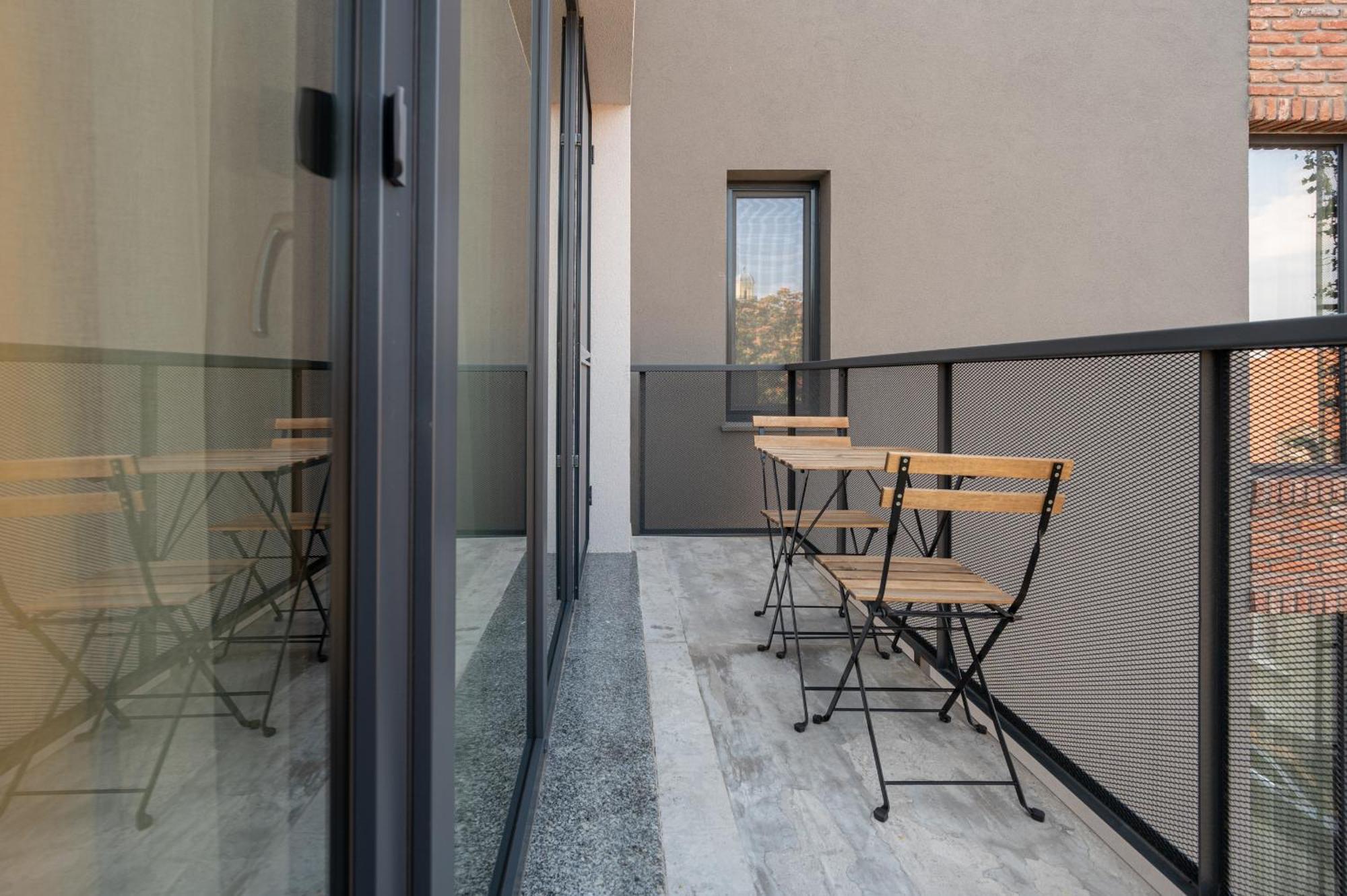 Calvin Aparthotel Nagyvárad Szoba fotó